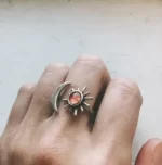 Amazing Sun And Moon Statement Ring on a finger