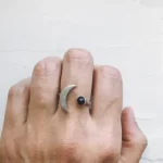 Daring Crescent Moon Ring With Black Onyx silver tone on a finger