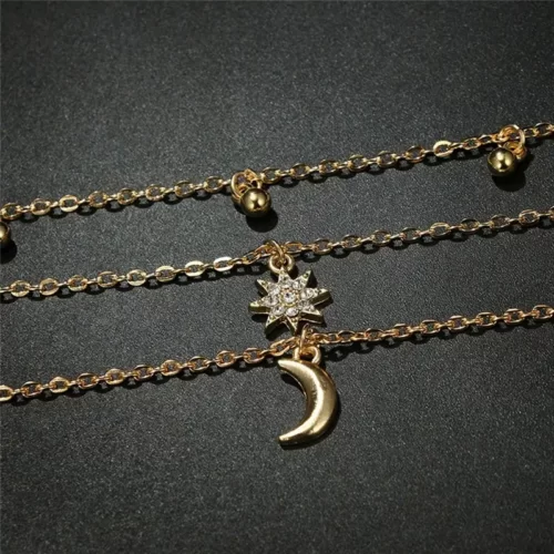 close up photo of the pendants of the Beautiful Moon Star Bead 3 Layer Necklace