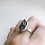 Stunning Oval Pure Meteorite Ring in Silver close up photo