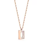 a close up photo of the Square Shell Necklace on a white background