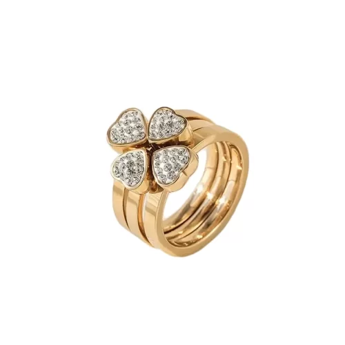 3-Stacked Gold Clover CZ Ring Set. Close up photo of this gold 4 leaf clover ring on a white background