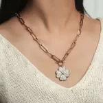 a woman wearing the Lucky 4-Leaf Clover Necklace with cubic zirconia