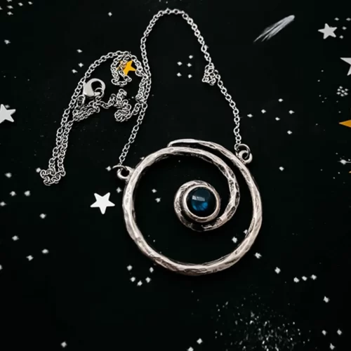 the Marvelous Handmade Spiral Silver Necklace on a black background