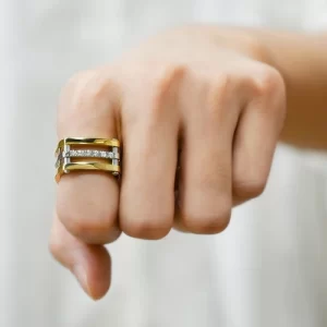 Gold Cocktail Paralleled Ring with Cubic Zirconia on a woman's hand