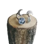 New Hand-Hammered Moon Phases Ring silver tone on a wood