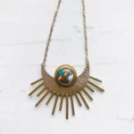 Unique Handmade Sun Pendant With Turquoise close up photo