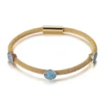 The Gold Cable Bangle With 3 Turquoise Stations