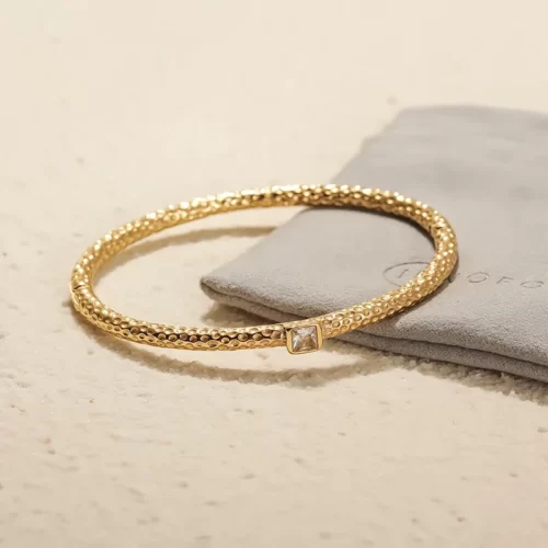 close up photo of the Terrific Golden Hammered Bangle Bracelet