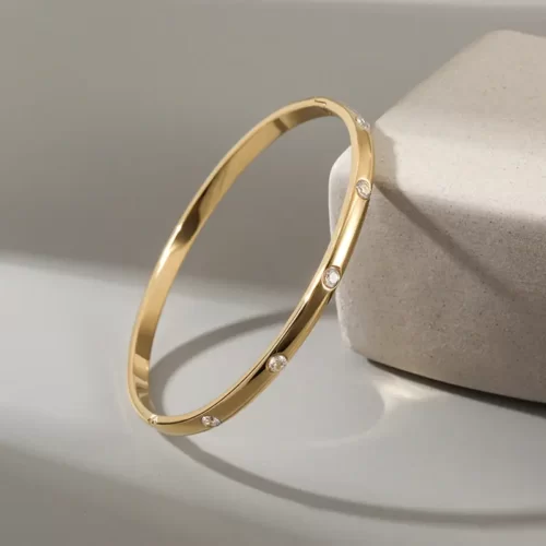 close up photo of the Wonderful Golden Bangle With Zirconia showing off the stones