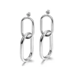 close up photo of the Attractive Interlocking Hoop Earrings in silver tone