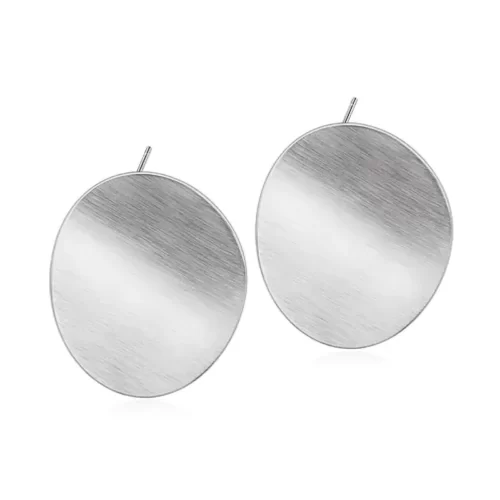 close up photo of the Eye-Catching Disc Statement Earrings in silver tone