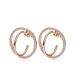 close up photo of the rose gold toned Special CZ Encrusted Coil-Link Earrings