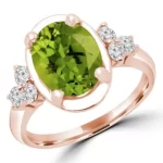 close up photo of the peridot stone of the Oval Green Peridot Cocktail Ring in 14k Solid Gold