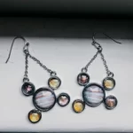 close up photo of the Jupiter and Galilean Moons Dangle Earrings