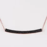 close up -photo of the rose gold version of the 925 Sterling Silver Black Tube Necklace